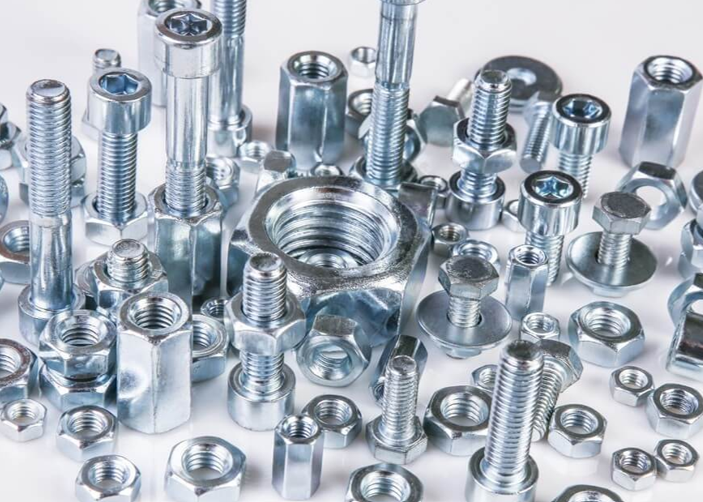 Assorted bolts and nuts organised in bins at MOREX ENTERPRISE hardware store